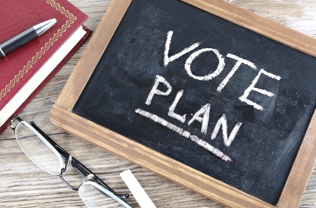 blackboard with Vote Plan chalked on it